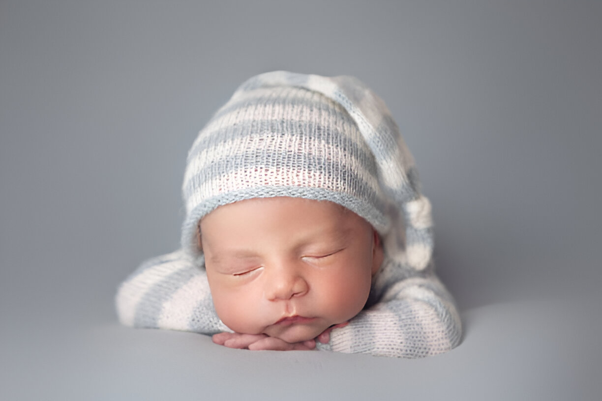 Baby peacefully sleeping in a cozy nursery, showcasing the importance of short naps for healthy infant sleep.